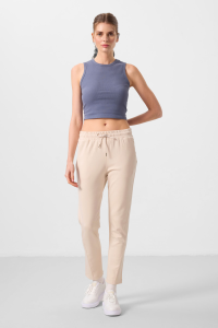 Бежевые мягкотекстурированные узкие брюки для женщин с скрытой молнией - 94668